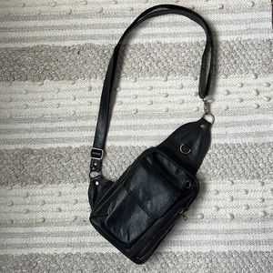 Black leather sling bag